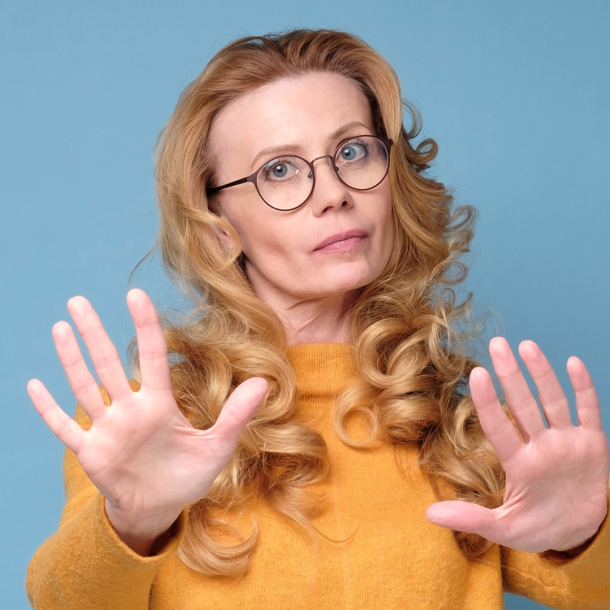 stressed-out-angry-mature-woman-keeping-hands-in-s-2022-11-10-18-23-10-utc.jpg